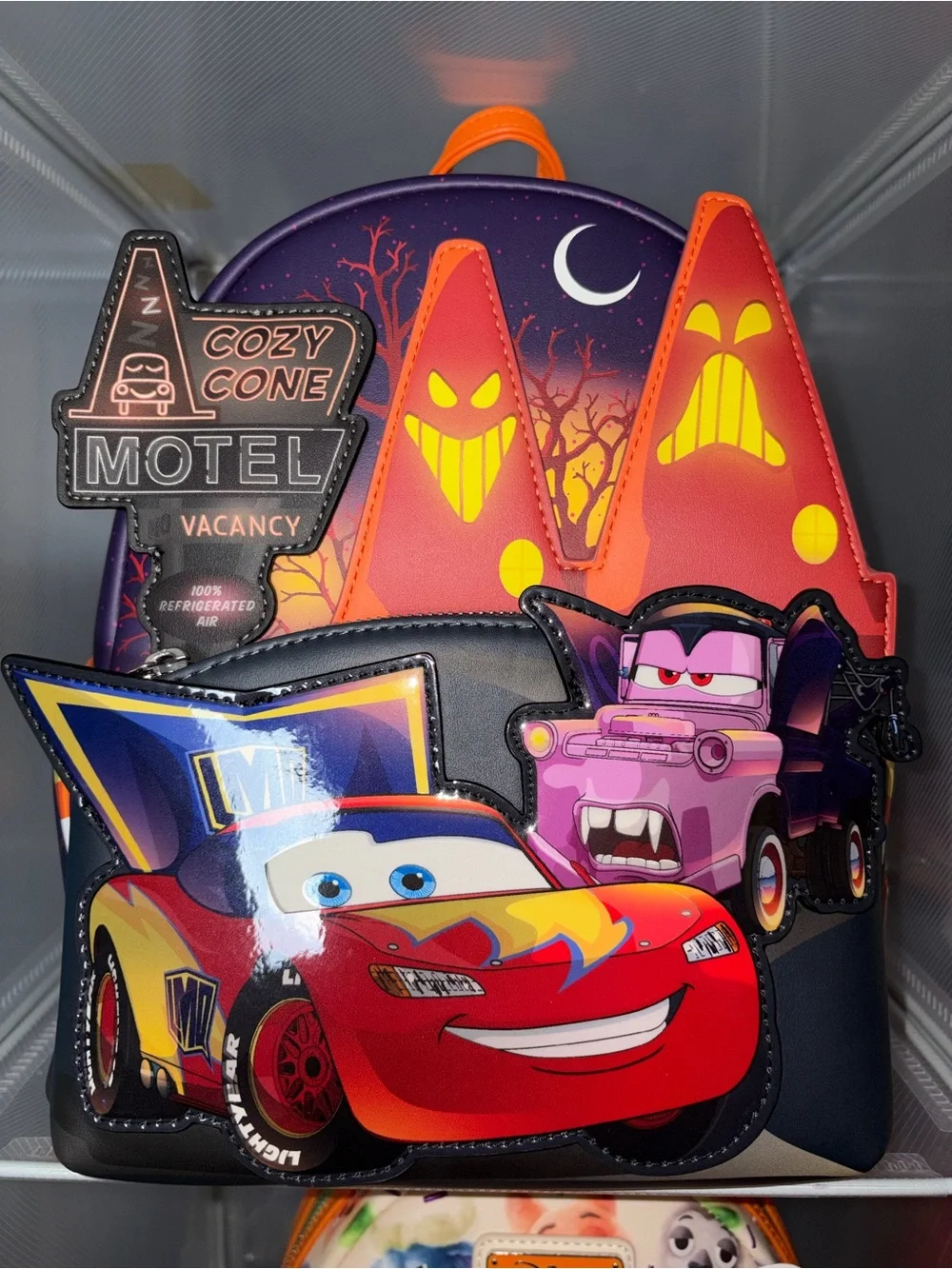 Loungefly Halloween Cars Cone Backpack in Orange & Purple